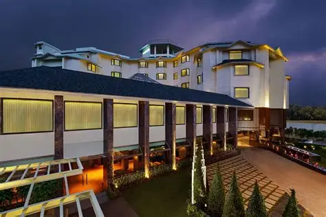 Description: As the premier 5-star destination in the state capital, this hotel features contemporary design infused with local Khasi tribal motifs. It offers ultra-modern rooms with floor-to-ceiling windows overlooking the pine-covered hills. The property includes a world-class fitness center, a heated indoor pool, and "Latitude," a signature restaurant serving gourmet Northeast Indian and global cuisines. Its central location provides a sophisticated base before heading into the rugged cave systems of the South.