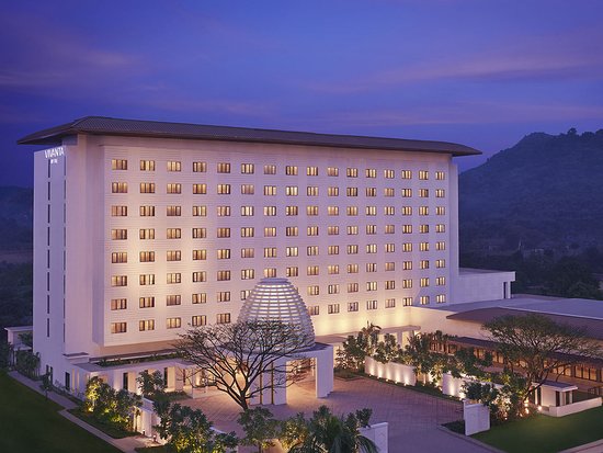 Description: A premier 4-star luxury hotel that blends modern elegance with traditional Assamese design. It features spacious rooms with large windows offering city or forest views, a world-class fitness center, and a temperature-controlled outdoor pool. The hotel’s signature restaurant, "Seven," serves authentic Northeast Indian gourmet cuisine alongside international favorites, providing a sophisticated start to your discovery tour.