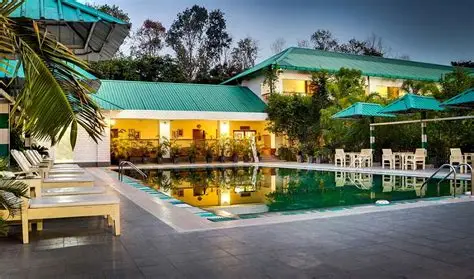 Description: An exquisite 4-star jungle resort situated at the edge of the Kaziranga National Park (Central Range). This property offers a true wilderness experience without compromising on luxury, featuring independent cottages with private sit-outs, a massive swimming pool, and a dedicated wellness spa. Its proximity to the safari gates makes it the ideal base for early morning wildlife expeditions.