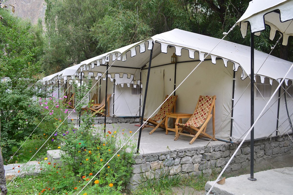 Description: While Turtuk is remote, this is the most elite "glamping" experience available in the village. It features luxury tents with wooden flooring, attached modern bathrooms, and private verandas overlooking apricot orchards and the Karakoram peaks. The camp is known for its gourmet Balti cuisine and impeccable service in a high-altitude border setting.
