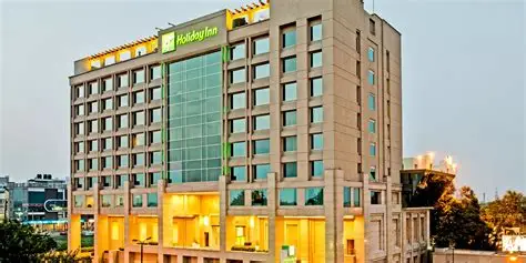 Description: Located in the upscale Ranjit Avenue area, this 5-star hotel offers a contemporary and sophisticated atmosphere. It features a stunning rooftop pool, a state-of-the-art gym, and spacious suites. After a day of exploring Jallianwala Bagh and the Wagah Border, guests can enjoy a variety of cuisines at Zest or unwind at the Bell-A-Sia restaurant. The hotel’s strategic location allows easy access to Amritsar's premium shopping and dining hubs.