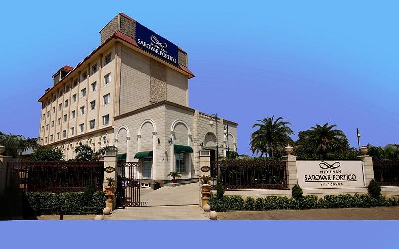 Nidhivan Sarovar Portico is a 4-star luxury hotel located in the spiritual town of Vrindavan. The hotel offers modern comfort along with a peaceful atmosphere, making it a popular choice for pilgrims and travelers visiting Vrindavan and nearby Mathura temples.