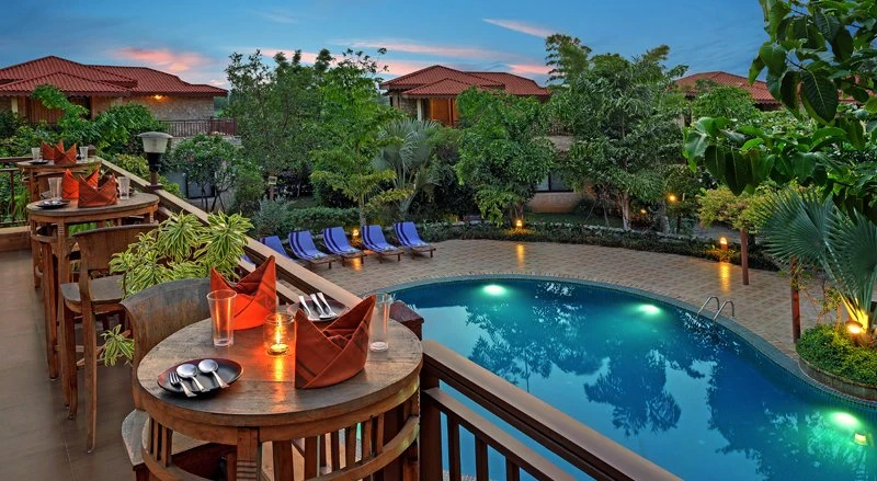A premium wildlife resort surrounded by forest landscapes, offering luxury cottages and modern facilities for travelers visiting Gir.

Highlights

Nature-style cottages and elegant rooms

Swimming pool and spa facilities

Multi-cuisine restaurant

Close to Gir jungle safari entry gate