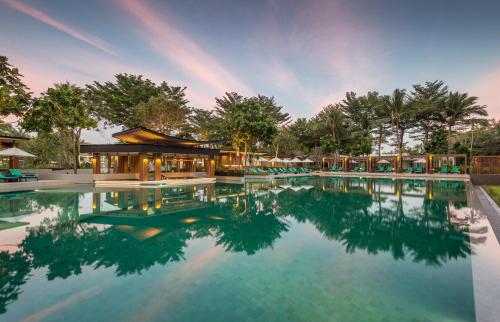 Banyan Tree Phuket is a world‑class 5‑star luxury villa resort set amidst lush tropical gardens and a peaceful saltwater lagoon in Phuket, Thailand. Each accommodation at this resort is a private pool villa, offering an unparalleled blend of privacy, comfort, and exclusive service.