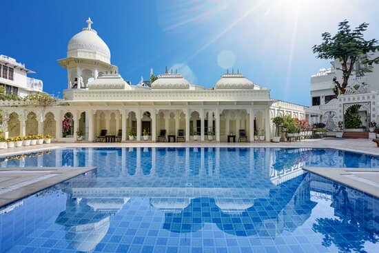 A Boutique Resort near the lake with a large pool and garden area, perfect for relaxing before your flight back home.
