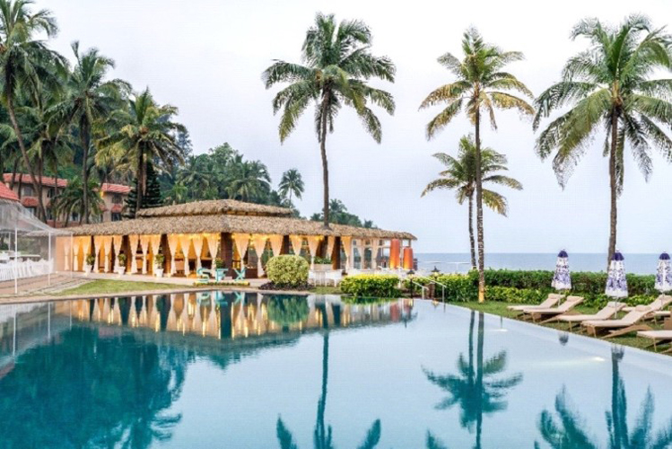 A high-energy, stylish resort at Vagator Beach. Features the famous "Rock Pool" and "Marvelous Suite" options with private terraces.