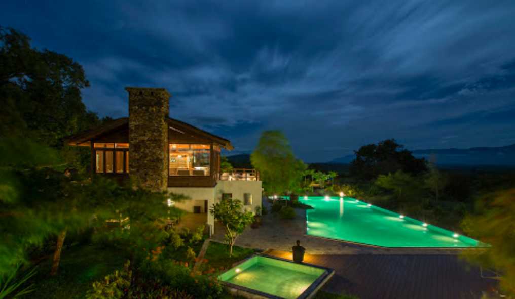 A world-class jungle resort where luxury meets the wild. The cottages offer stone walls, wooden floors, and large windows that open directly into the forest buffer zone.